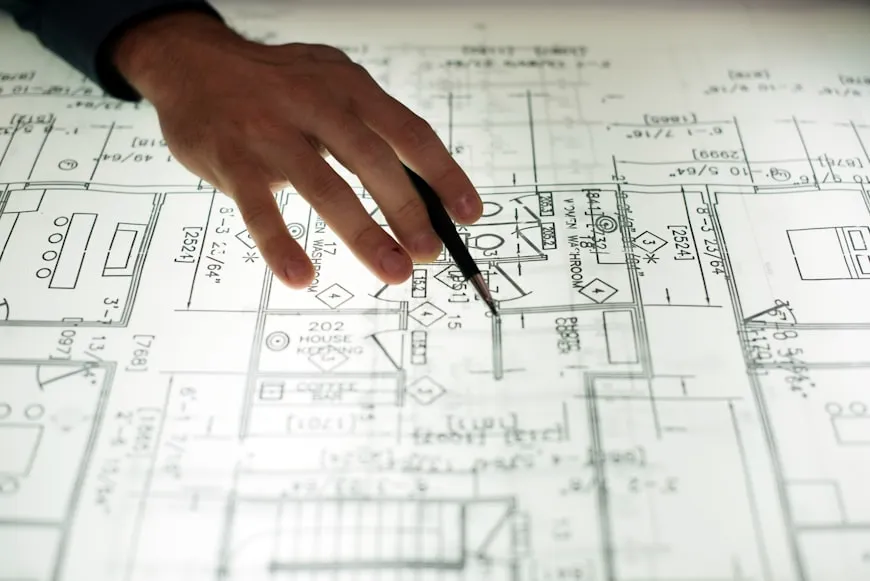 Architectural firms. Close up of hands working on layout
